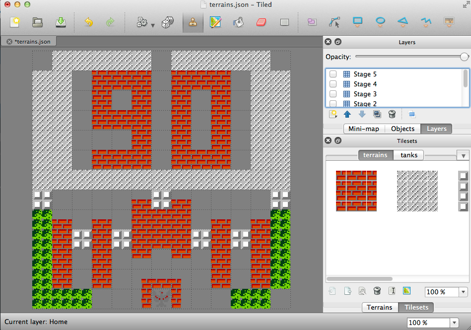 Designing a stage in the Tiled map editor, with stage layers and a terrains tileset of brick, steel and grass tiles